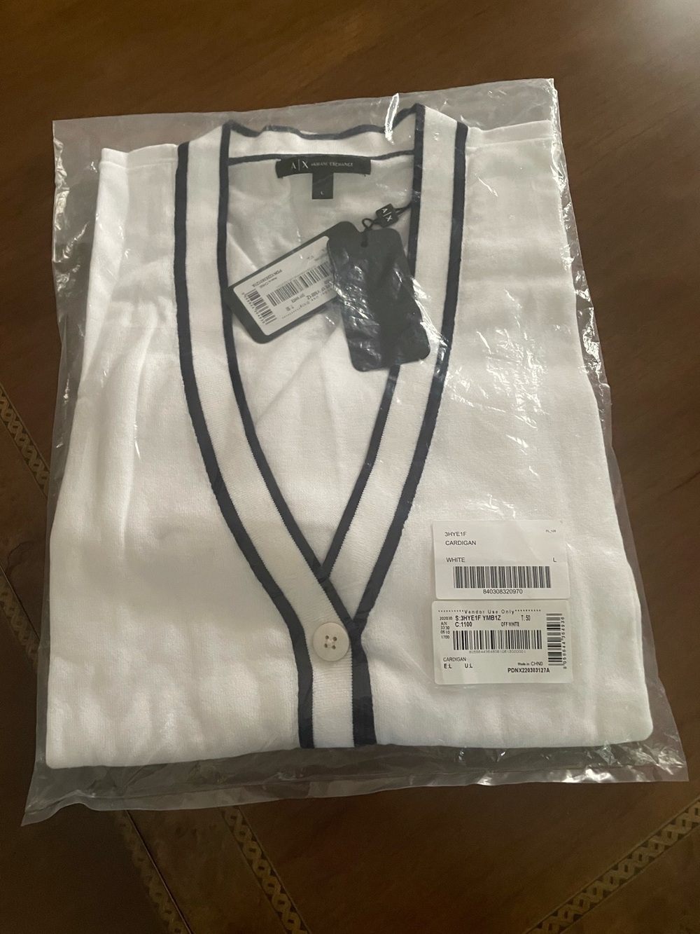 Armani Exchange woman’s White Cardigan with black Trim